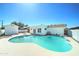Large backyard pool surrounded by ample patio space, perfect for relaxing and enjoying the outdoors at 8220 E Montecito Ave, Scottsdale, AZ 85251