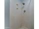 Classic shower stall with standard fixtures and a built-in soap dish at 8220 E Montecito Ave, Scottsdale, AZ 85251