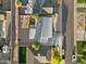 Birds eye view of roof, backyard, and residential street with parked cars at 8524 E Mariposa Dr, Scottsdale, AZ 85251