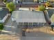Birds eye view of the residence highlights the backyard, covered parking, and neighborhood at 8524 E Mariposa Dr, Scottsdale, AZ 85251