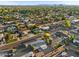 Aerial view of a residential neighborhood featuring tree lined street and cozy single Gathering homes at 8524 E Mariposa Dr, Scottsdale, AZ 85251