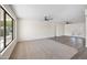 Spacious living area boasts new flooring, fresh paint, and abundant natural light at 8524 E Mariposa Dr, Scottsdale, AZ 85251