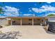 Expansive backyard featuring a spacious covered patio and large concrete area perfect for entertaining at 8602 N 27Th Ave, Phoenix, AZ 85051