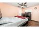 Comfortable bedroom with wood floors, neutral walls, and ample natural light at 8602 N 27Th Ave, Phoenix, AZ 85051
