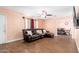 Comfortable living room with wood floors and view to dining room at 8602 N 27Th Ave, Phoenix, AZ 85051