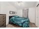 Bedroom with stylish decor, a comfortable bed, and a soothing ambiance for relaxation at 8840 E Sunland Ave # 137, Mesa, AZ 85208