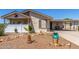 Charming single-story home featuring decorative rock landscaping and a covered carport at 8840 E Sunland Ave # 137, Mesa, AZ 85208