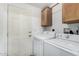 Functional laundry room with washer, dryer and ample storage space at 8840 E Sunland Ave # 137, Mesa, AZ 85208