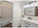 Traditional style bathroom with updated vanity, sink and lighting and a combined shower and tub at 942 S Ash Ave # 104, Tempe, AZ 85281
