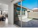 View from inside house to the private backyard with patio at 9510 E Theia Dr, Mesa, AZ 85212