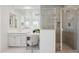 This bathroom features a vanity area, glass shower, and modern finishes at 9510 E Theia Dr, Mesa, AZ 85212