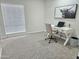 Bedroom with a laptop desk, carpet flooring and natural light from the window at 9612 N 52Nd Dr, Glendale, AZ 85302