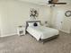 A beautifully decorated bedroom with a cozy bed and elegant nightstands at 9612 N 52Nd Dr, Glendale, AZ 85302