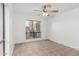 Bedroom with tile flooring and large windows at 1010 E Lois Ln, Phoenix, AZ 85020