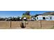 View of a parking lot with RV parking for residential recreational vehicles with mountain views at 1010 E Lois Ln, Phoenix, AZ 85020