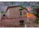 Charming backyard with decorative rock, pavers, mature landscaping, and a cozy fire pit for relaxing evenings at 10811 W Avenida Del Rey --, Peoria, AZ 85383