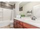 Well-lit bathroom features a vanity with wood cabinets and decorative accents at 10811 W Avenida Del Rey --, Peoria, AZ 85383