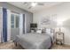 Cozy bedroom with a ceiling fan, plush carpet, and a comfortable bed creates a relaxing retreat at 10811 W Avenida Del Rey --, Peoria, AZ 85383