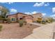 Charming single-story home with desert landscaping and a two-car garage, perfect for low-maintenance living at 10811 W Avenida Del Rey --, Peoria, AZ 85383