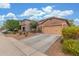 Single Gathering home with a two-car garage and a long driveway in a suburban neighborhood at 10811 W Avenida Del Rey --, Peoria, AZ 85383