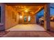 Inviting covered patio featuring string lights and a ceiling fan, perfect for outdoor relaxation and entertaining at 10811 W Avenida Del Rey --, Peoria, AZ 85383