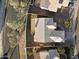 Aerial view of a residential home, showcasing its backyard, roof, landscaping, and proximity to neighboring properties at 1120 E Harbor View Dr, Gilbert, AZ 85234