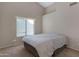 Bedroom featuring a large bed and window for natural light at 1120 E Harbor View Dr, Gilbert, AZ 85234