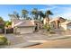 Well-maintained single-story home with a two-car garage and low maintenance landscaping at 1120 E Harbor View Dr, Gilbert, AZ 85234