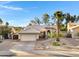 Charming single-story home featuring a two-car garage and desert landscaping at 1120 E Harbor View Dr, Gilbert, AZ 85234