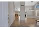 Inviting foyer with tile floors, open floorplan, and a view into the living room fireplace at 1120 E Harbor View Dr, Gilbert, AZ 85234