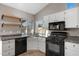 Bright kitchen with granite countertops, stainless dishwasher, and gas range at 1120 E Harbor View Dr, Gilbert, AZ 85234