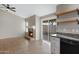 Open-concept space with a cozy fireplace and direct access to the backyard at 1120 E Harbor View Dr, Gilbert, AZ 85234