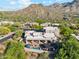 Stunning aerial view of an estate with a pool and outdoor living spaces nestled in nature at 11398 E Desert Vista Rd, Scottsdale, AZ 85255