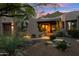 Cozy courtyard featuring desert landscaping, rock accents, and a neutral color palette creating a private outdoor space at 11398 E Desert Vista Rd, Scottsdale, AZ 85255