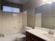 Compact bathroom with a bathtub, shower, toilet, and vanity sink at 11403 W Rosewood Dr, Avondale, AZ 85392