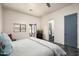 Relaxing bedroom with a peek into en-suite bath and an outdoor view, creating a private retreat at 11426 E Quail Ln, Cave Creek, AZ 85331