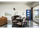 Dining area with a modern table set and views at 11426 E Quail Ln, Cave Creek, AZ 85331