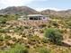 Beautiful desert home with native landscaping, nestled in a serene natural setting with mountain views at 11426 E Quail Ln, Cave Creek, AZ 85331