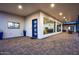 Modern home featuring a covered patio with an outdoor kitchen and large windows at 11426 E Quail Ln, Cave Creek, AZ 85331