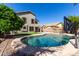 Beautiful backyard pool with cool, clear water and a basketball hoop for outdoor recreation at 11455 E Persimmon Ave, Mesa, AZ 85212
