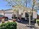 Charming single-story home with a well-maintained front yard and inviting front porch seating at 12027 W Morning Dove Dr, Sun City, AZ 85373