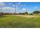 Community park featuring a sand volleyball court and well-manicured lawn at 12027 W Morning Dove Dr, Sun City, AZ 85373