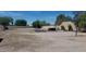 Large backyard with a basketball hoop, a hot tub and space for outdoor activities at 12210 N 67Th St, Scottsdale, AZ 85254