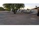 Expansive backyard with gravel, gazebo, RV, and seating area, ideal for outdoor living and entertainment at 12210 N 67Th St, Scottsdale, AZ 85254