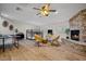 Entertainment room, featuring a stone fireplace, seating area, ping pong table, and a bunk bed at 12210 N 67Th St, Scottsdale, AZ 85254