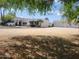 Single-Gathering home with a three-car garage and drought-tolerant landscaping at 12210 N 67Th St, Scottsdale, AZ 85254