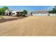 Charming single-story home featuring a rustic facade and spacious front yard at 12210 N 67Th St, Scottsdale, AZ 85254