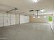 Spacious three-car garage with multiple garage doors and plenty of room at 12210 N 67Th St, Scottsdale, AZ 85254