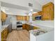 Well-appointed kitchen features stainless steel appliances, custom cabinets and bright countertops at 12210 N 67Th St, Scottsdale, AZ 85254
