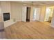 Bright, spacious main bedroom featuring a fireplace, ceiling fan and an ensuite bath and closet at 12210 N 67Th St, Scottsdale, AZ 85254